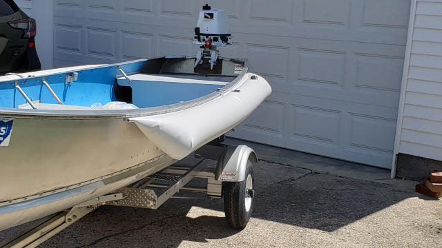 8-inch diameter white inflatable sponsons enhancing small boat stability